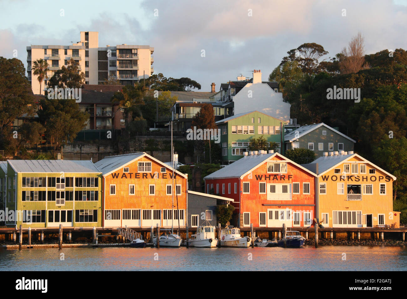 The colourful buildings of the Waterview Wharf Workshops in the Sydney suburb of Balmain. Stock Photo