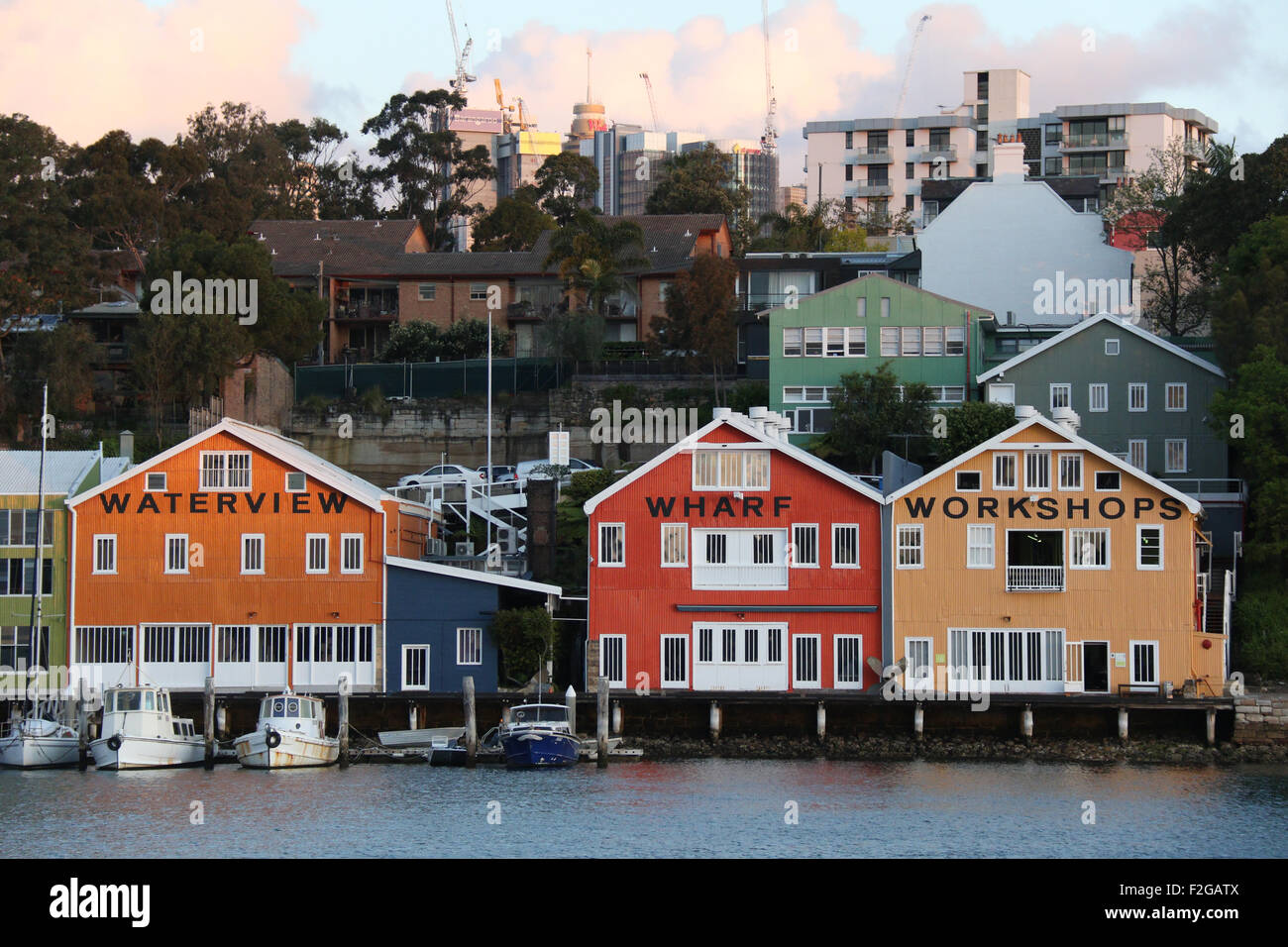 The colourful buildings of the Waterview Wharf Workshops in the Sydney suburb of Balmain. Stock Photo