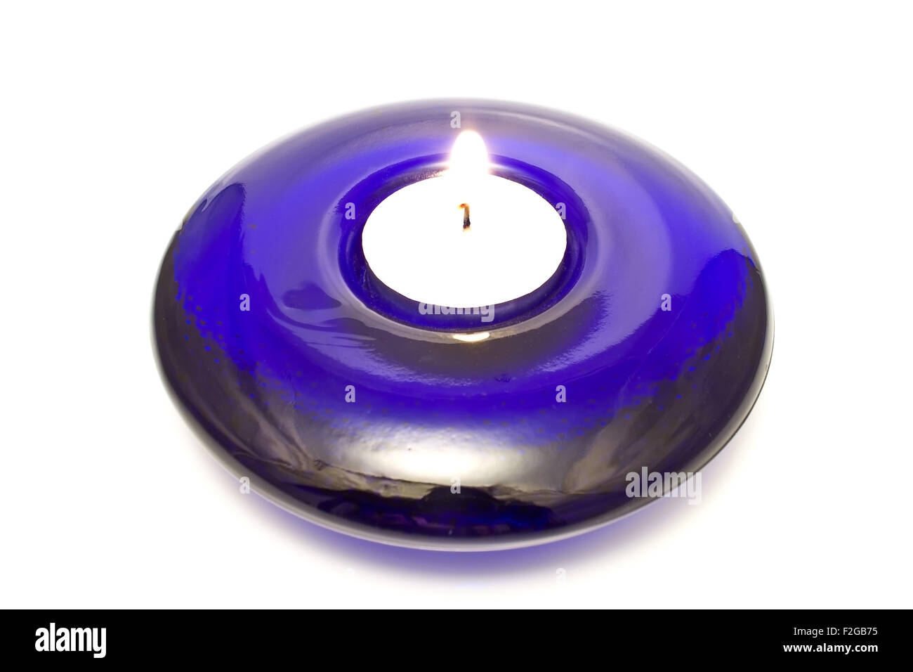 Blue glass candle holder isolated on white Stock Photo Alamy