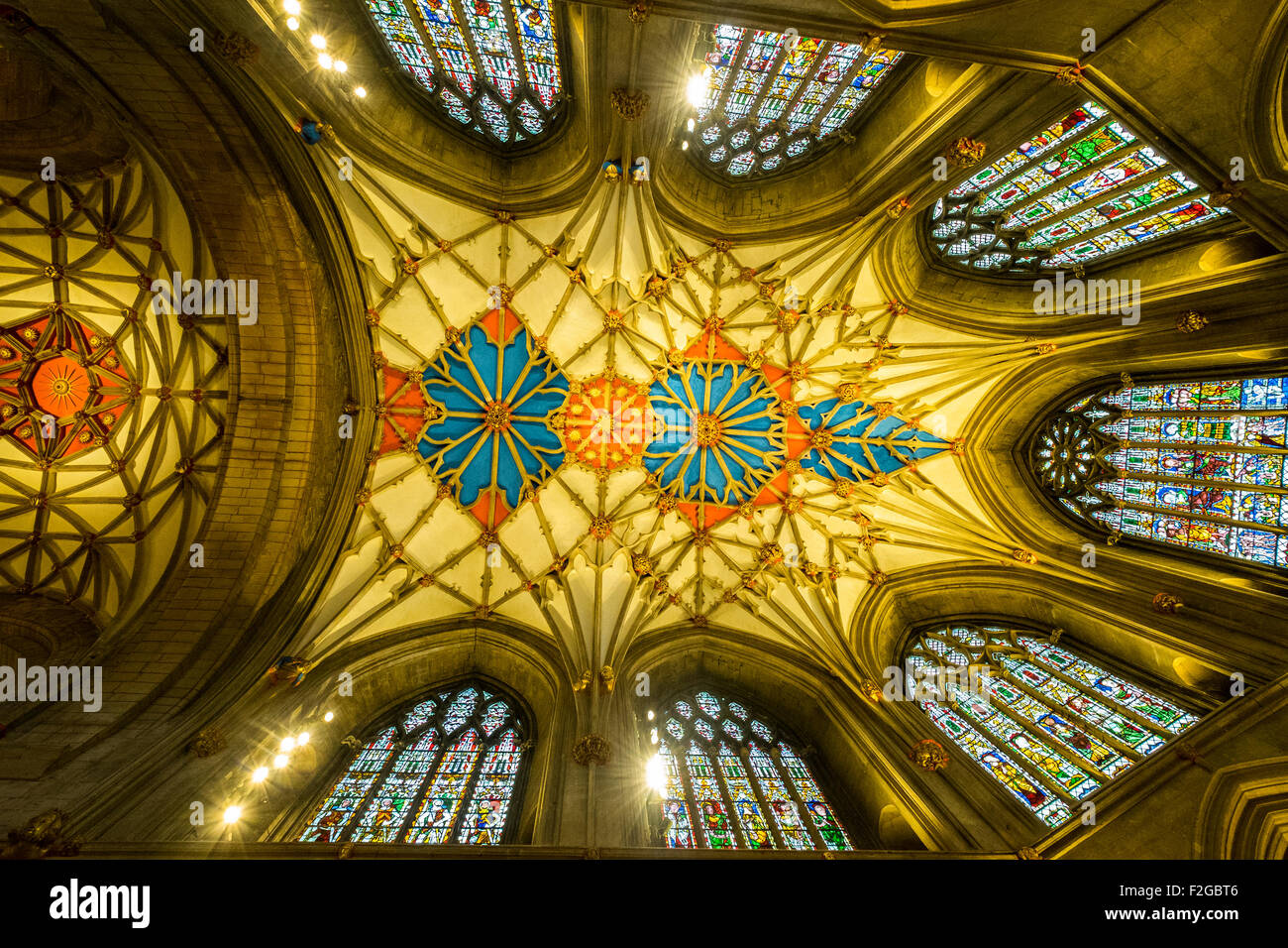 Ceiling and stained glass windows of Tewkesbury Abbey Stock Photo