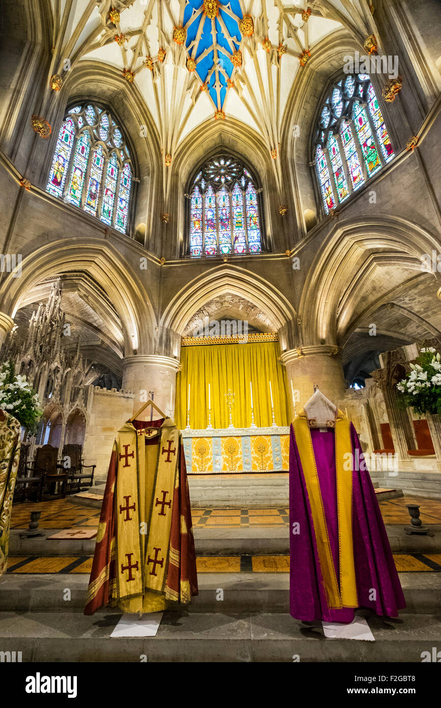 Display of clerical copes in front of the high alter, Tewkesbury Abbey Stock Photo