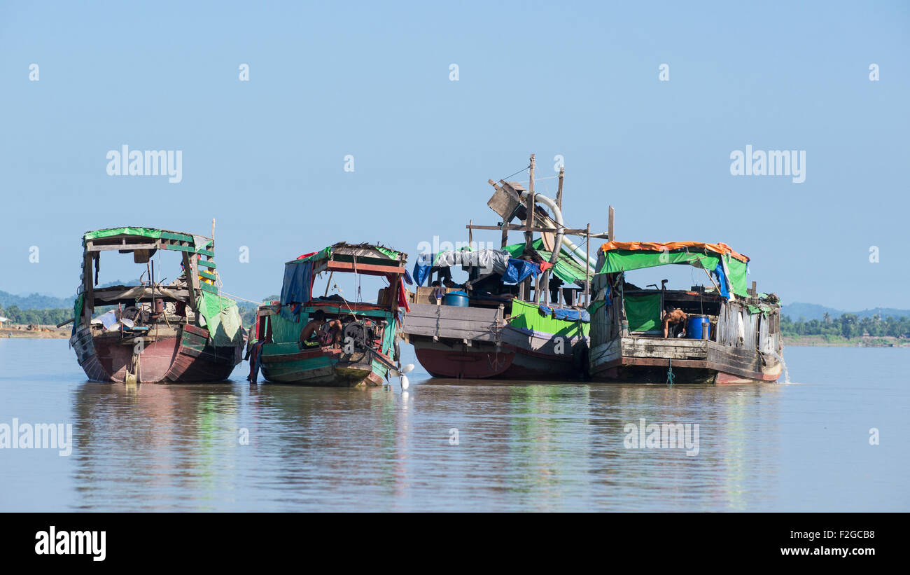 4 cargo vessels moored on Lay Myo River in western Rakhine State in Myanmar. Stock Photo