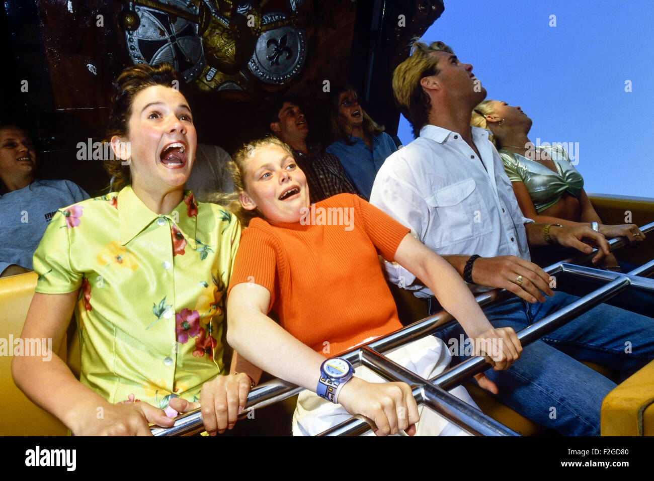 Young people on a fairground ride at Bottom' Pleasure Beach. Skegness. England. UK Stock Photo