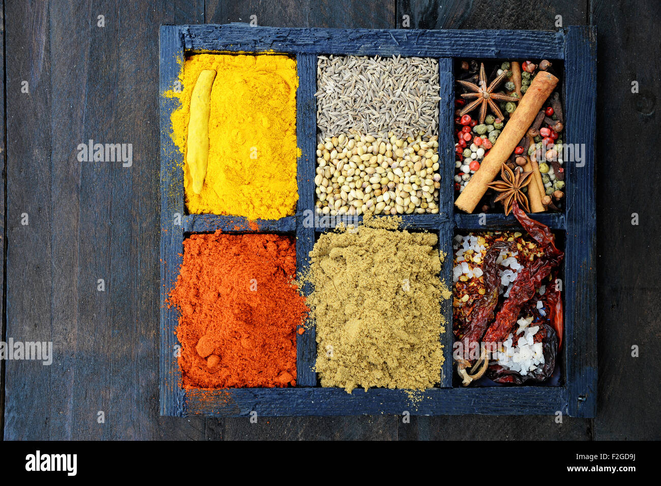 Indian spices on wooden background Stock Photo