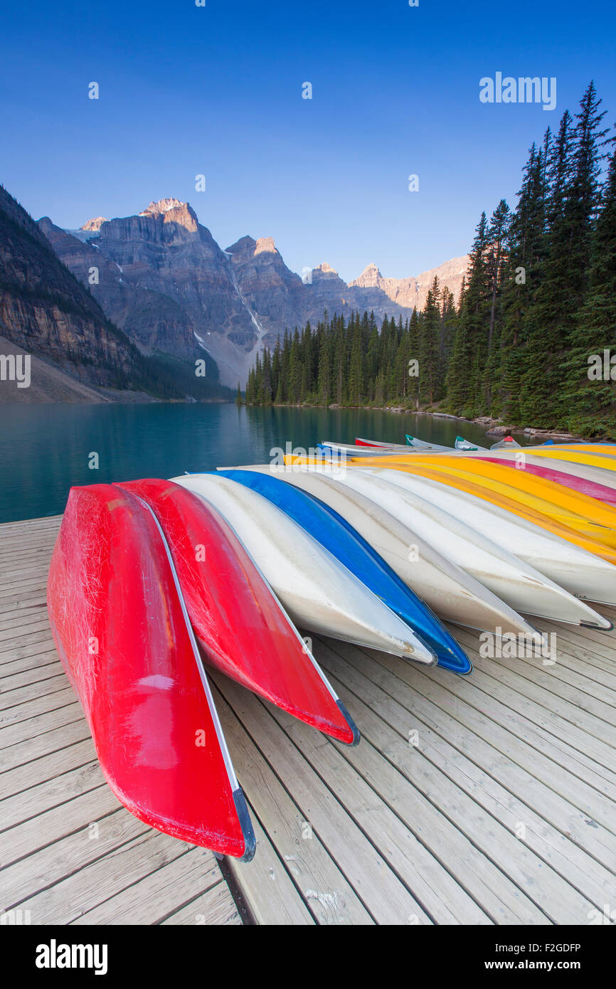Colourful canoes at Moraine Lake in the Valley of the Ten Peaks, Banff