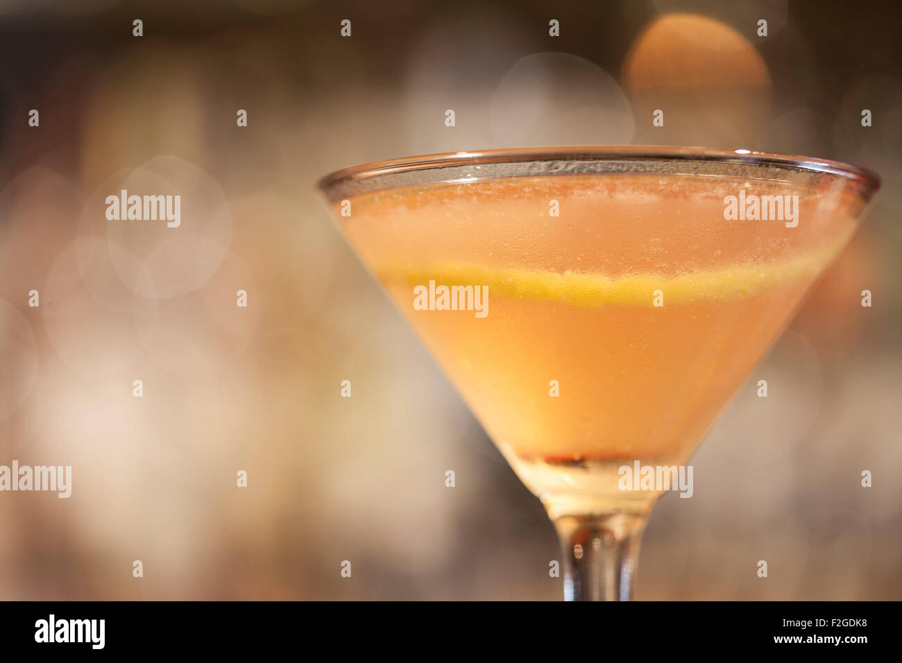 cocktail in martini glass with lemon sliver Stock Photo