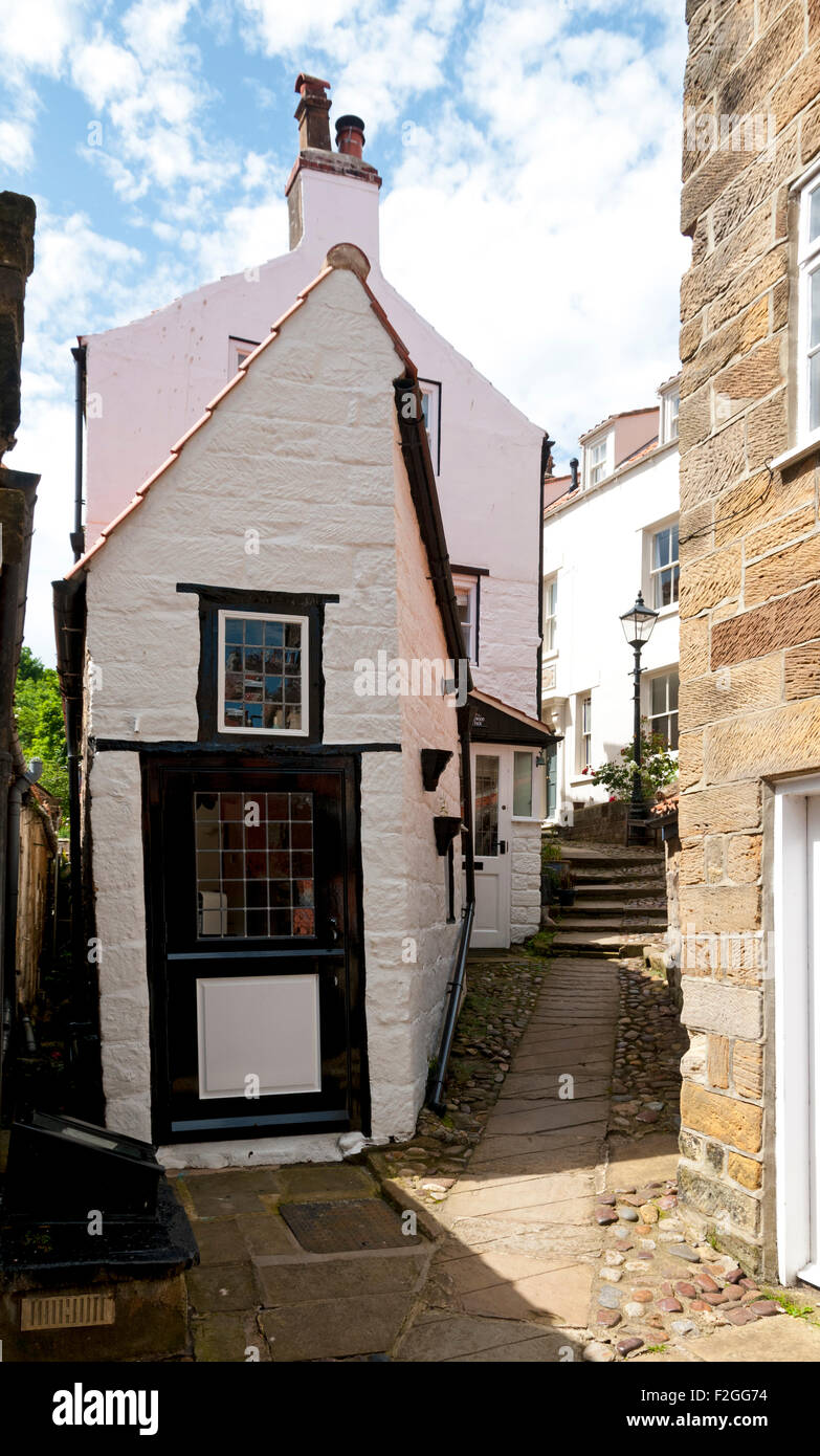 Houses in one of the narrow passages, or allyways, in Robin Hood's Bay village. Yorkshire