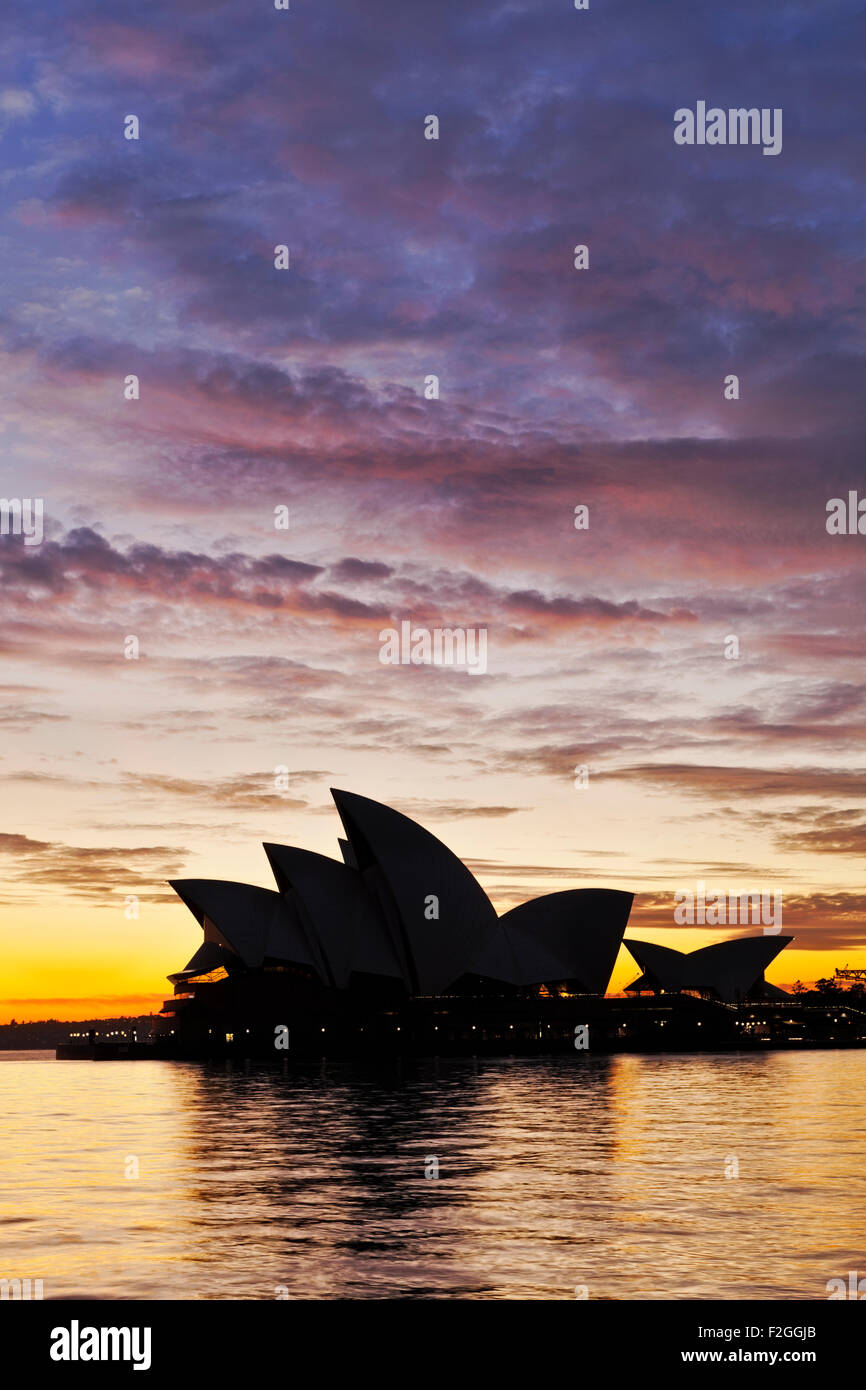 A view of Sydney Harbour and Opera House at dawn. Stock Photo