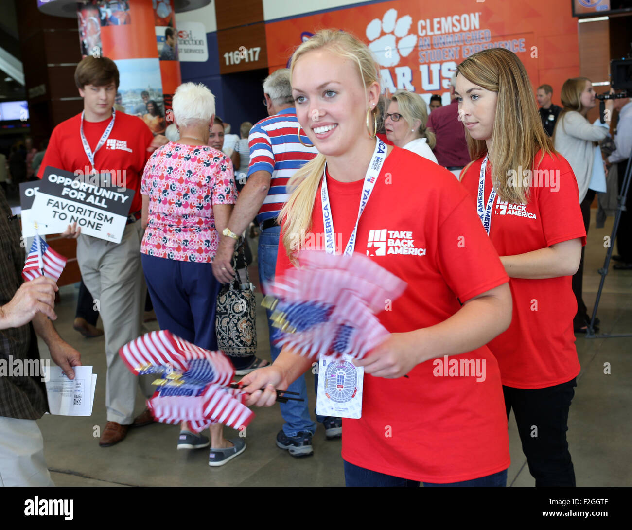 Greenville, SC, USA. 18th September, 2015. Staff distribute American