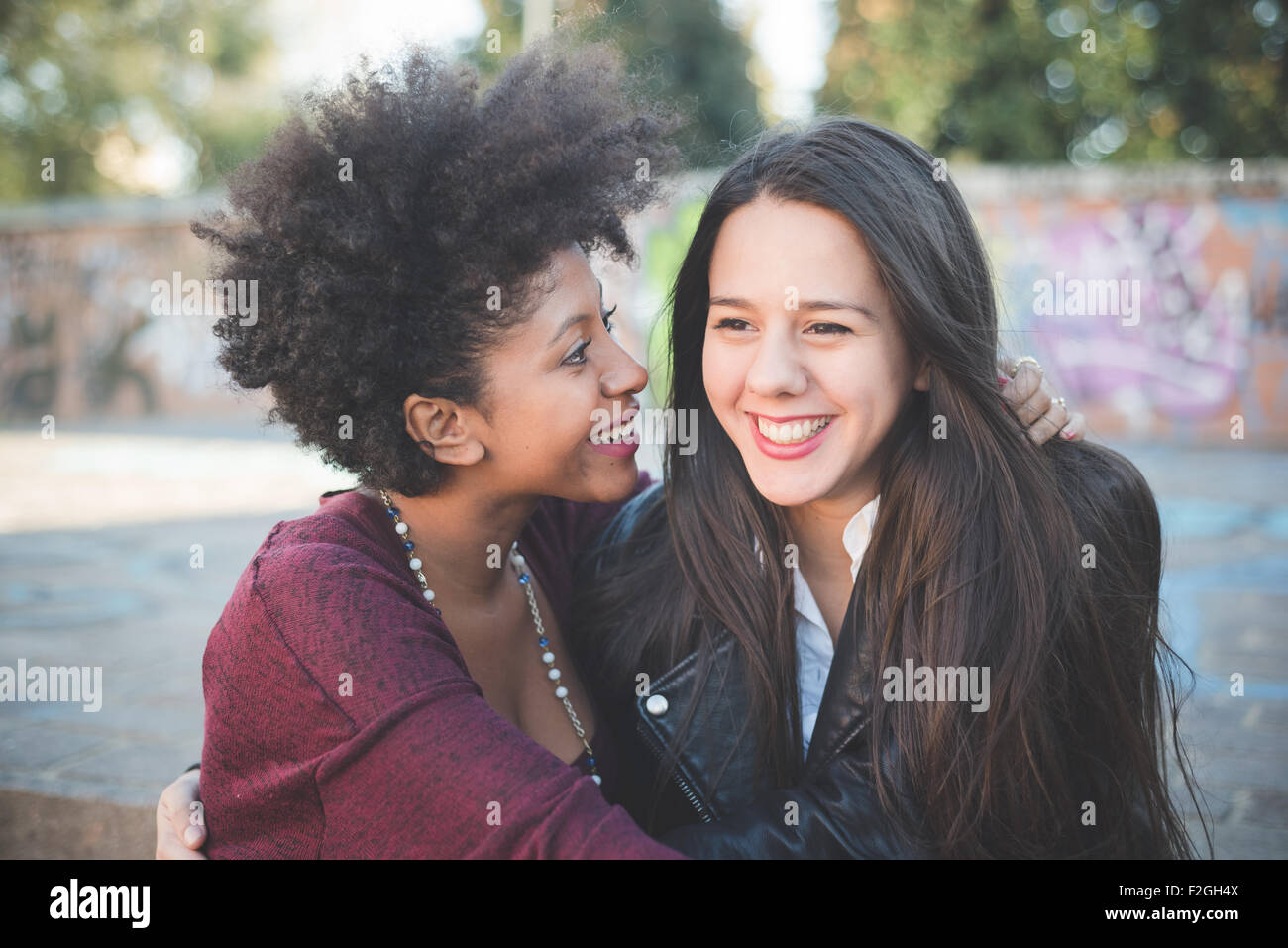 Two Black Women Hugging Each Other Stock Photos & Two Black Women ...