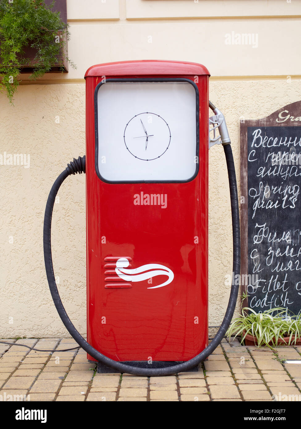 Photo of a Red petrol pump Stock Photo