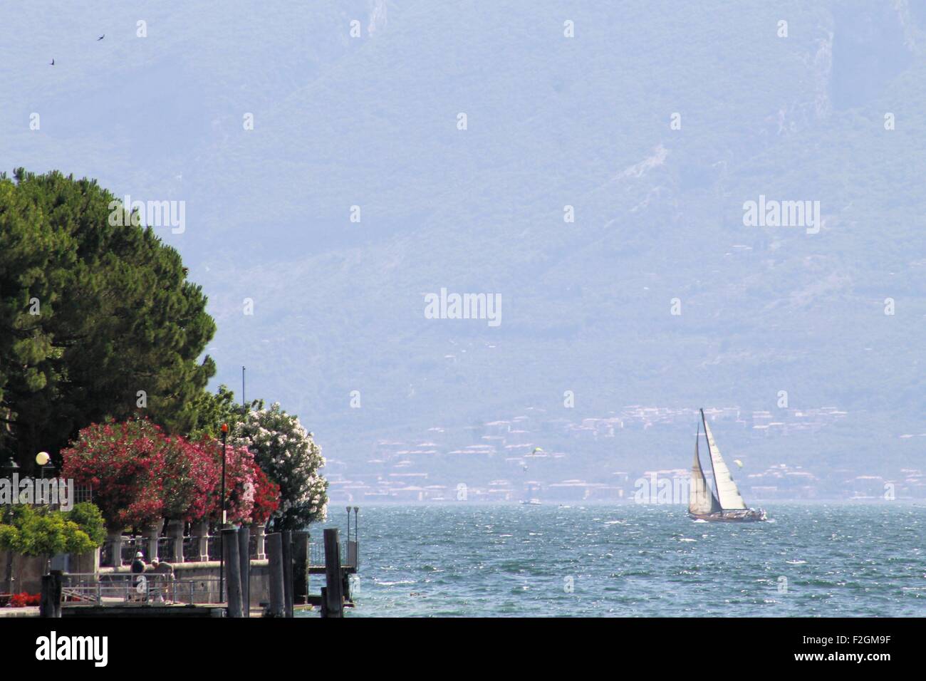 sailing boat on lake Garda in northern Italy Stock Photo