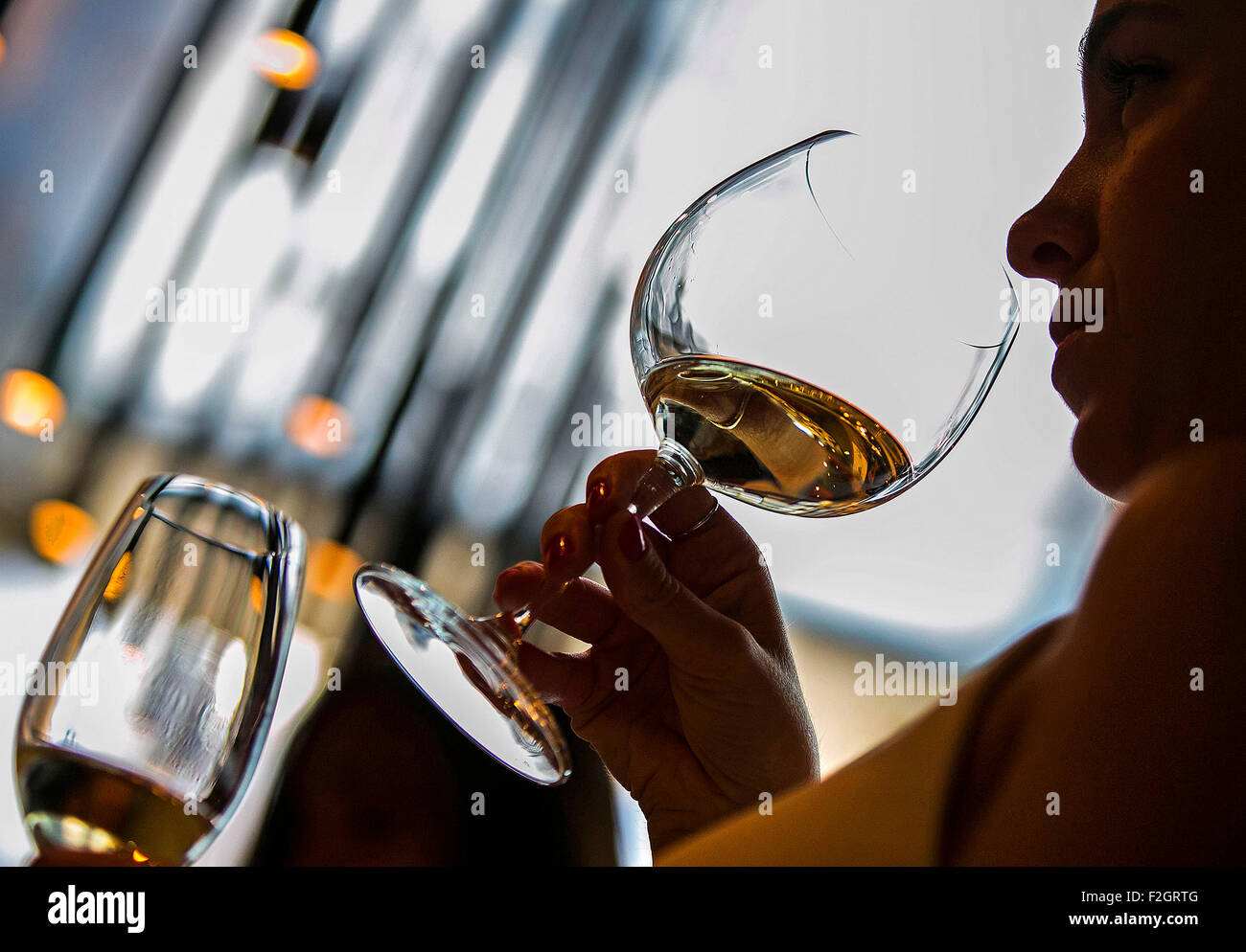 wine sommelier smelling a cup of wine aroma before taste Stock Photo