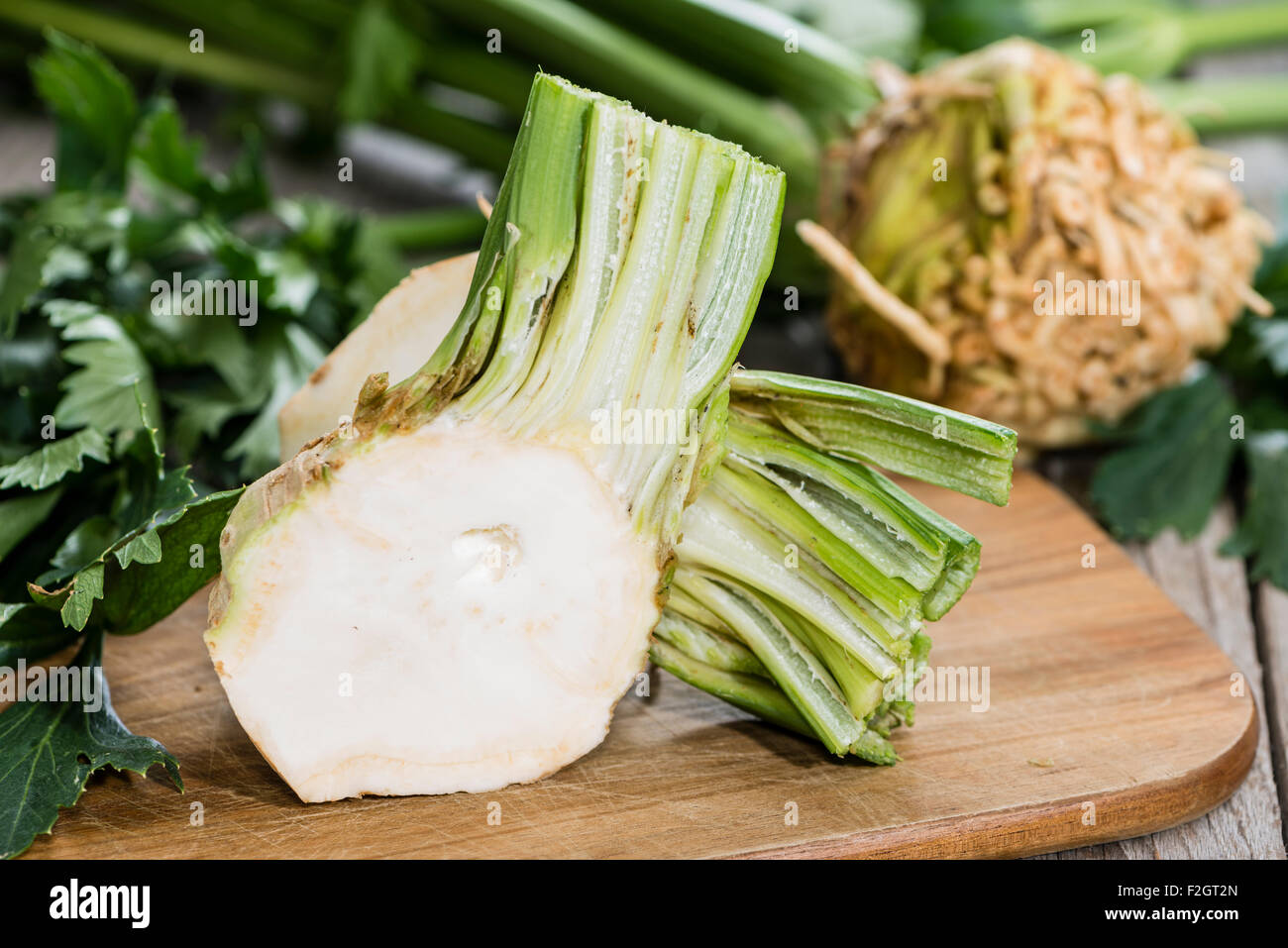 Fresh Celeriac on wooden background (detailed close-up shot) Stock Photo