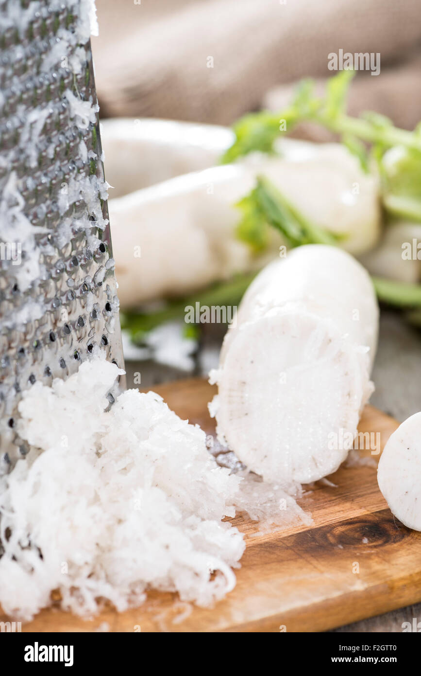 Portion of grated Horseradish on wooden background Stock Photo Alamy