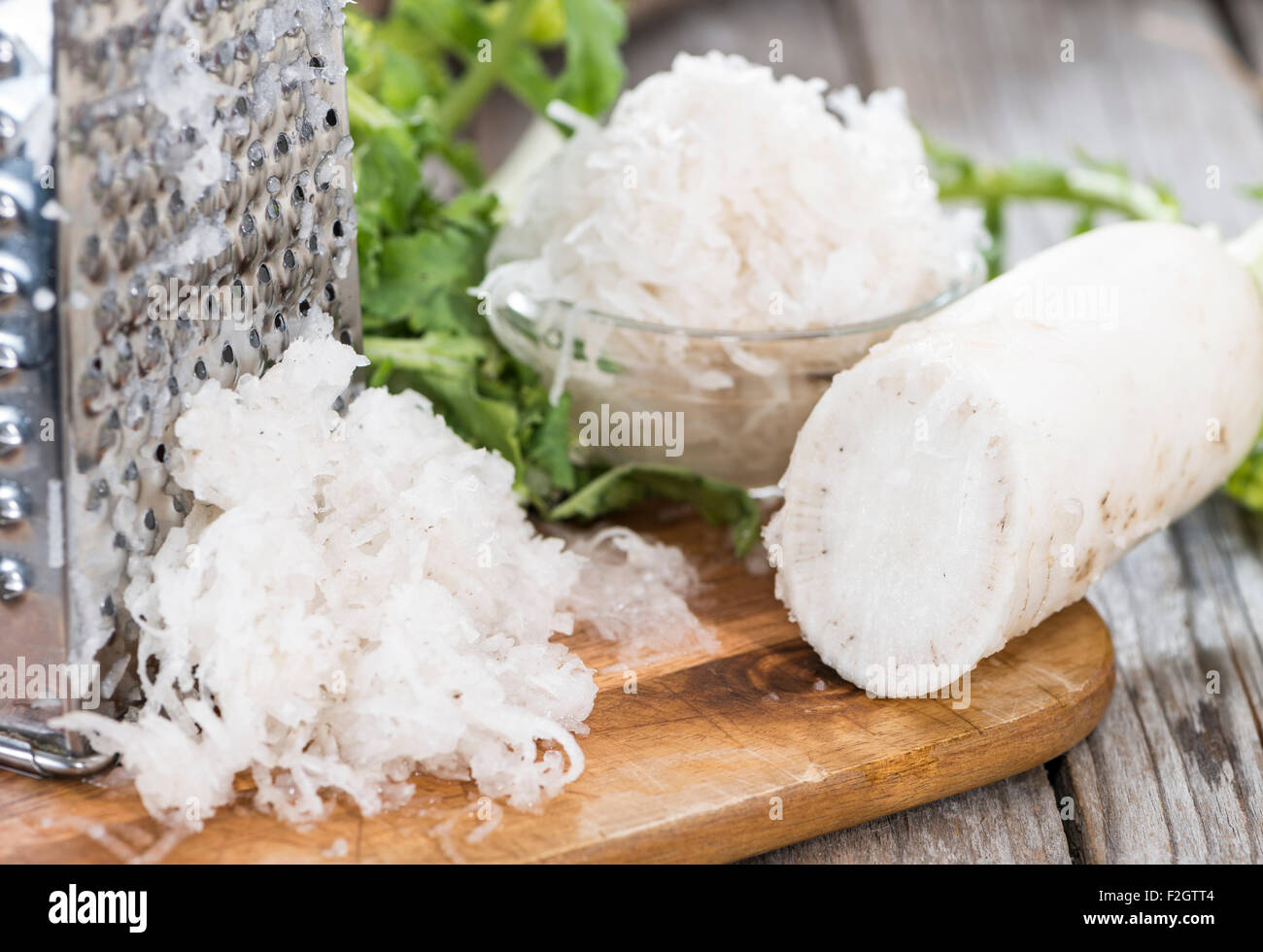 Portion of grated Horseradish on wooden background Stock Photo Alamy
