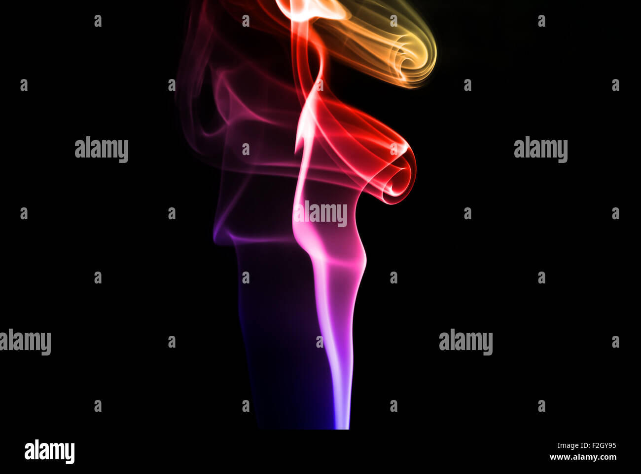 Abstract beautiful colorful smoke on black background Stock Photo - Alamy