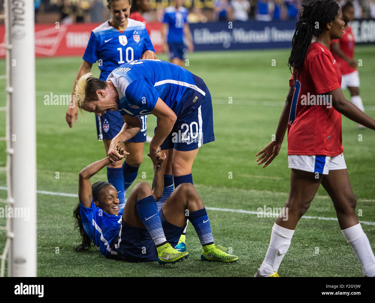 Detroit, Michigan, USA. 17th Sep, 2015. Abby Wambach, USA (20), celebrities the first Team USA goal of Crystal Dunn (25) during the International Friendly Soccer Match between the United States Women's National Team and the Haitian Women's National Team at Ford Field in Detroit, Michigan. USA won the match 5-0. Credit:  Scott Hasse/ZUMA Wire/Alamy Live News Stock Photo