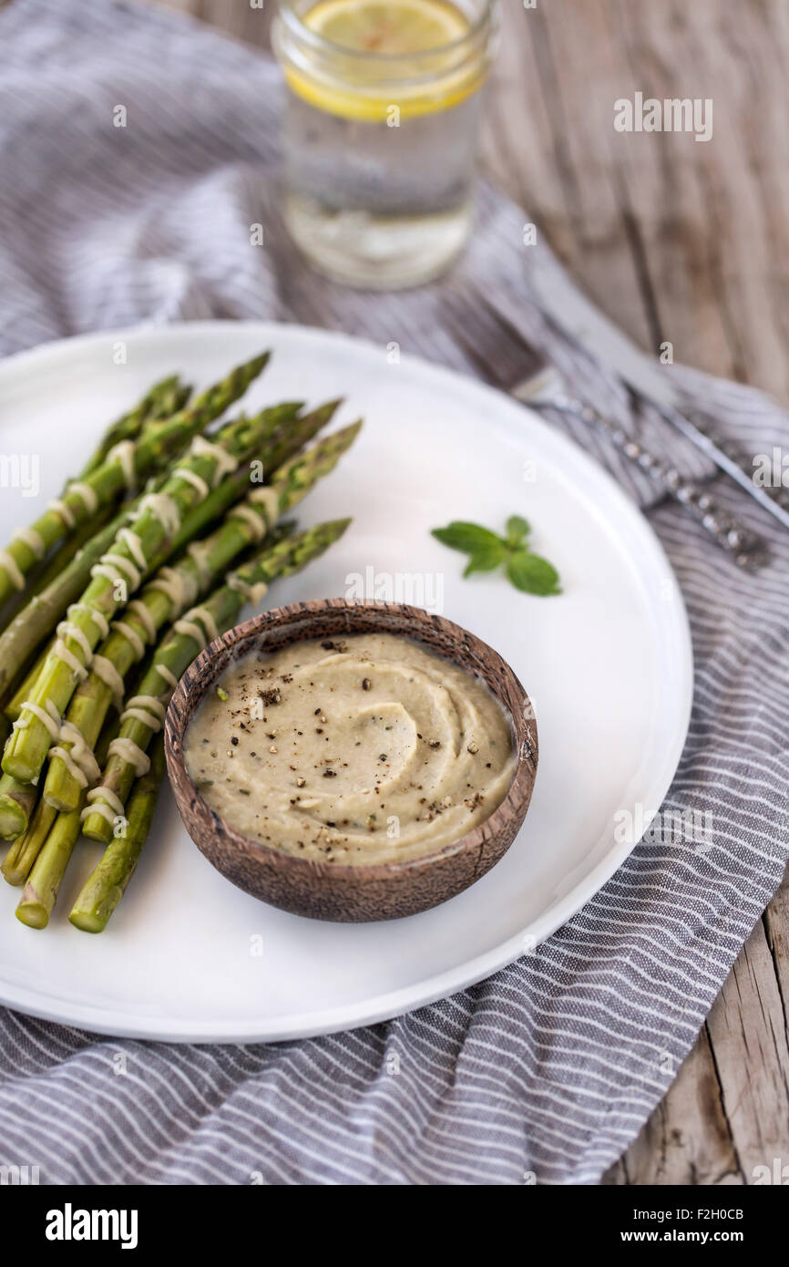 Steamed Asparagus served with White Bean and Artichoke Aioli Dip
