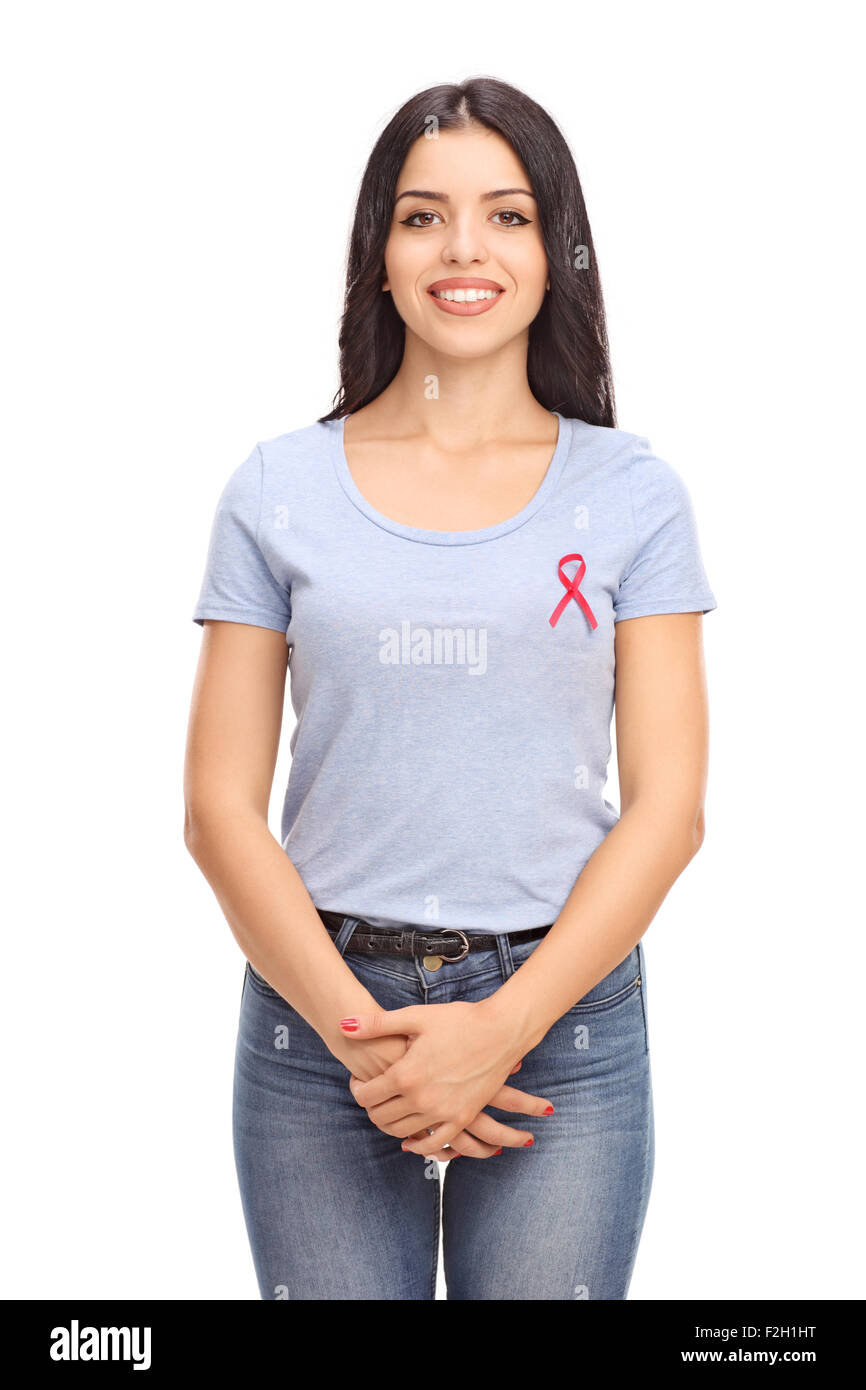 Vertical shot of a woman posing with AIDS badge on her shirt isolated on white background Stock Photo