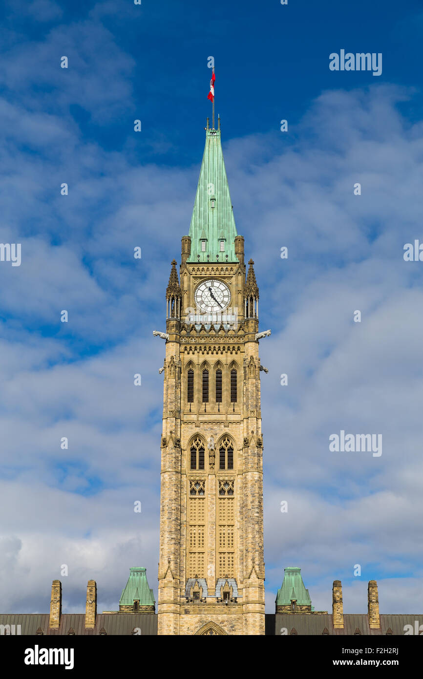 Closeup to the Ottawa Parliament Clock Tower in Canada during the day Stock Photo