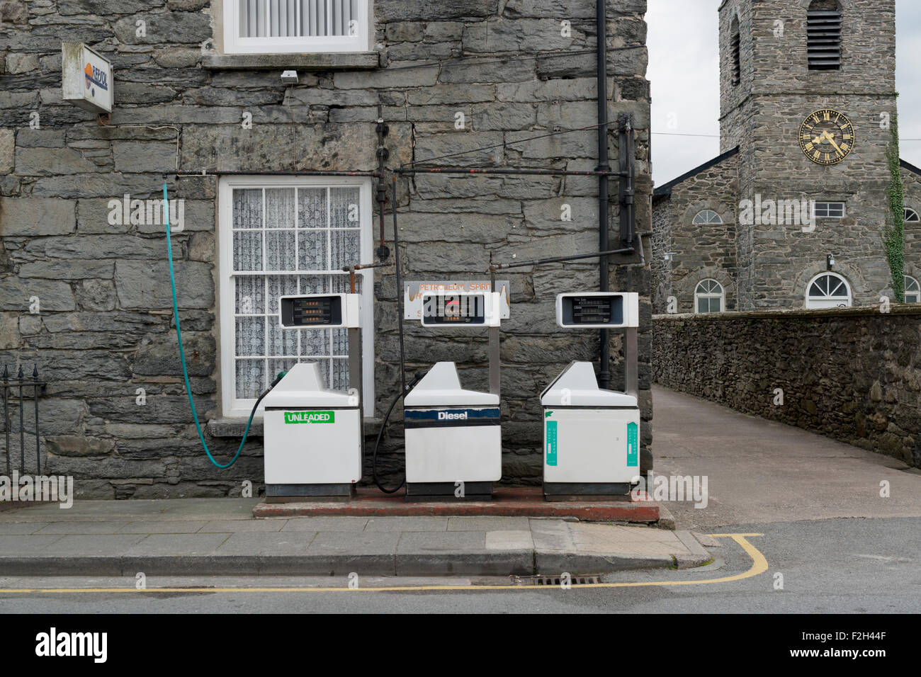 A small quirky petrol filling station in the small Welsh town of Bala in Gwynedd in Wales, UK. Stock Photo