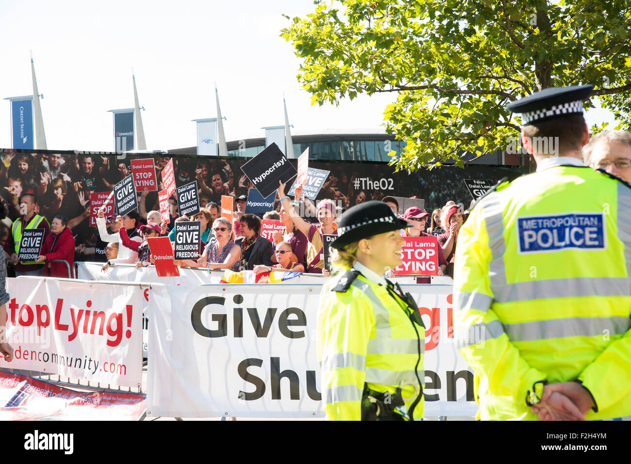 London, UK. 19th September, 2015. Protest organised by International shugden community outside O2 arena before the appearance of the Dalai Lama part of his UK Tour.Report show religious intolerance and segregation practices, including signs above shops and medical facilities refusing service to people of shugden faith. Credit:  Pete Lusabia/Alamy Live News Stock Photo