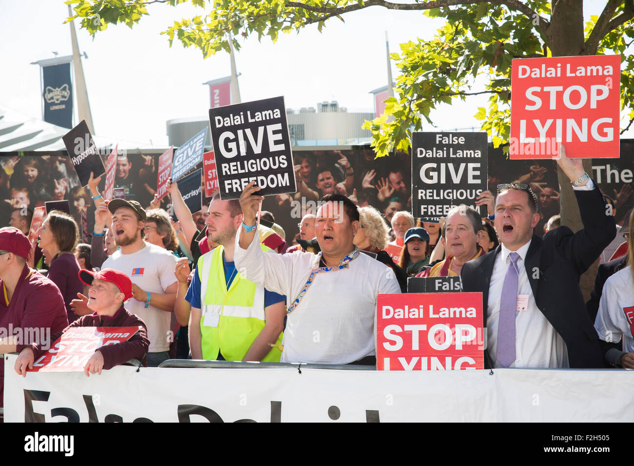 London, UK. 19th September, 2015. Protest organised by International shugden community outside O2 arena before the appearance of the Dalai Lama part of his UK Tour.Report show religious intolerance and segregation practices, including signs above shops and medical facilities refusing service to people of shugden faith. Credit:  Pete Lusabia/Alamy Live News Stock Photo