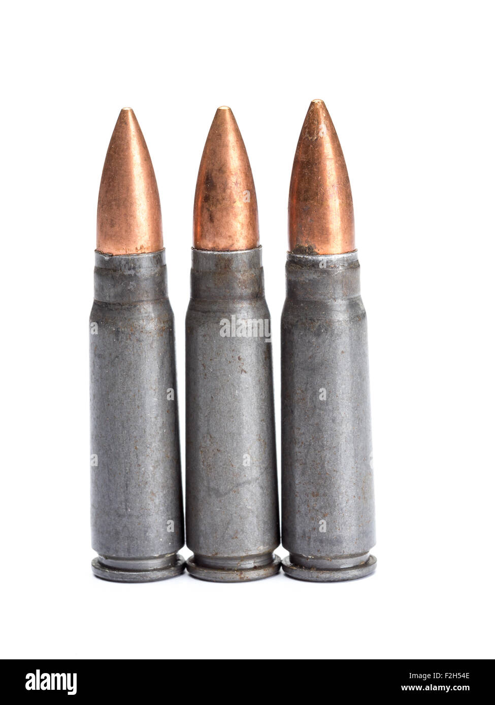 Three rifle bullets shot on white Stock Photo