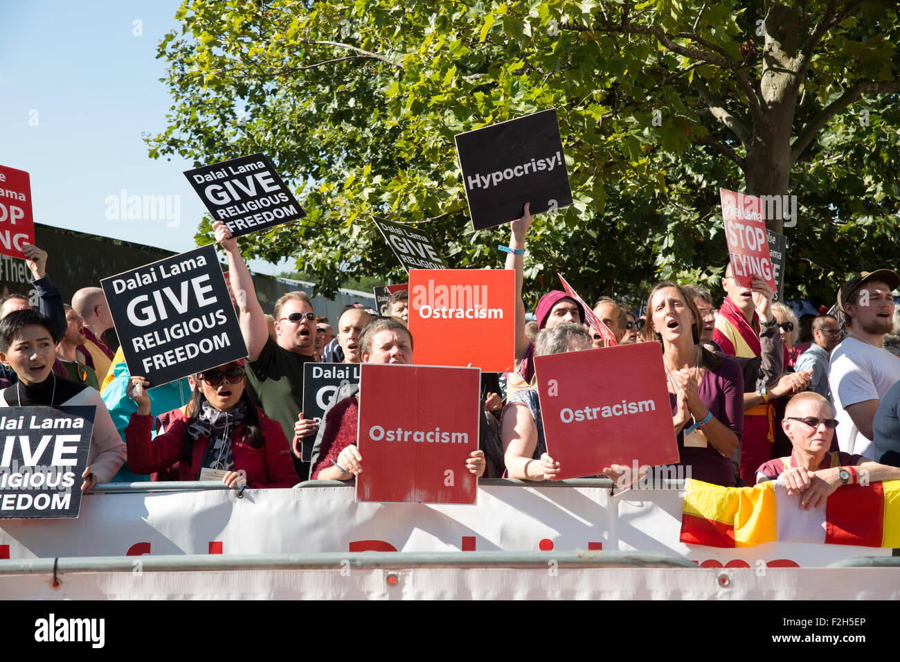 London, UK. 19th September, 2015. Protest organised by International shugden community outside O2 arena before the appearance of the Dalai Lama part of his UK Tour.Report show religious intolerance and segregation practices, including signs above shops and medical facilities refusing service to people of shugden faith. Credit:  Pete Lusabia/Alamy Live News Stock Photo