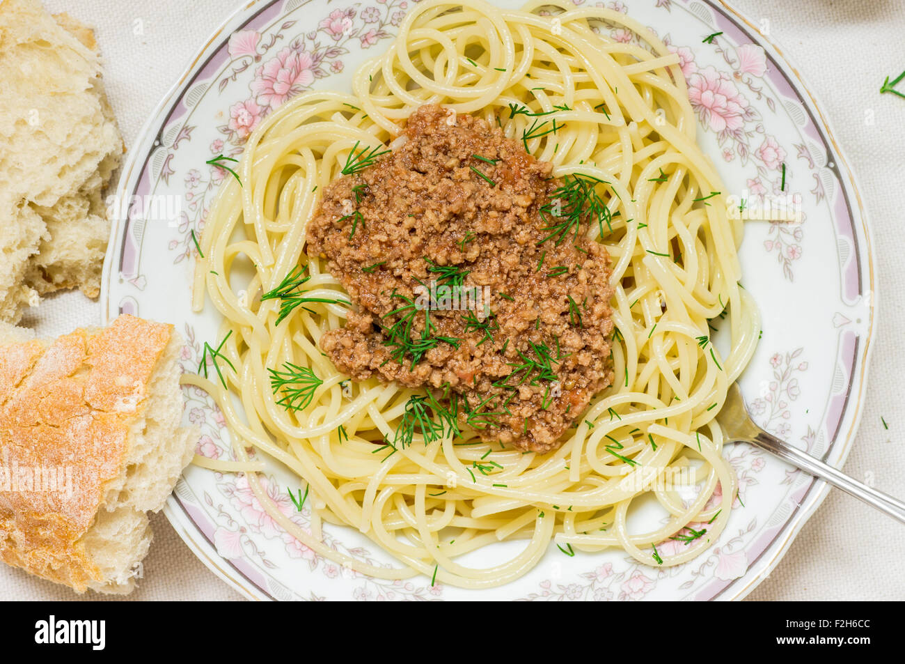 Spaghetti bolognese, ciabatta and white wine top view Stock Photo Alamy