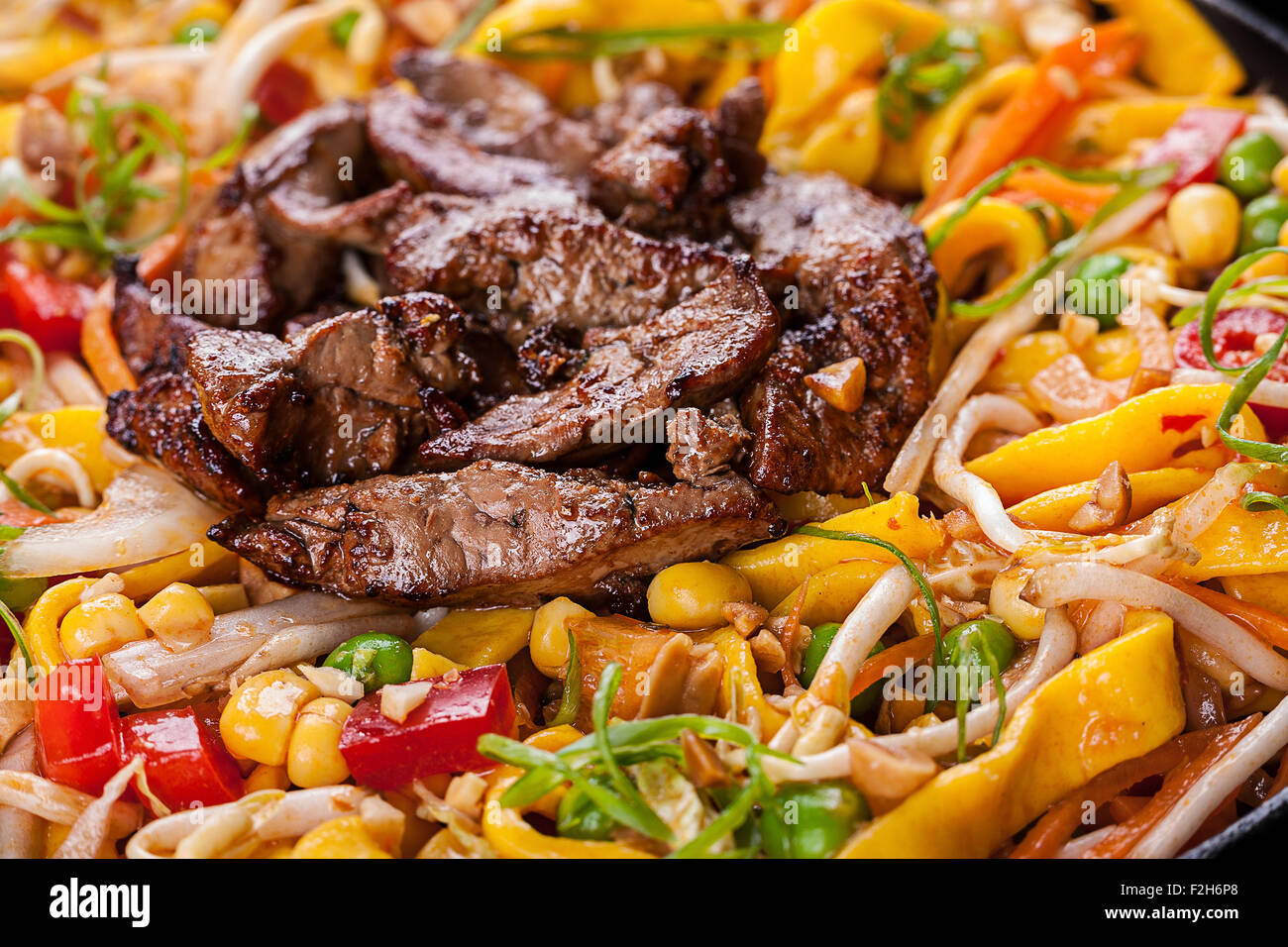Fried chicken liver with egg noodle and vegetable Stock Photo Alamy