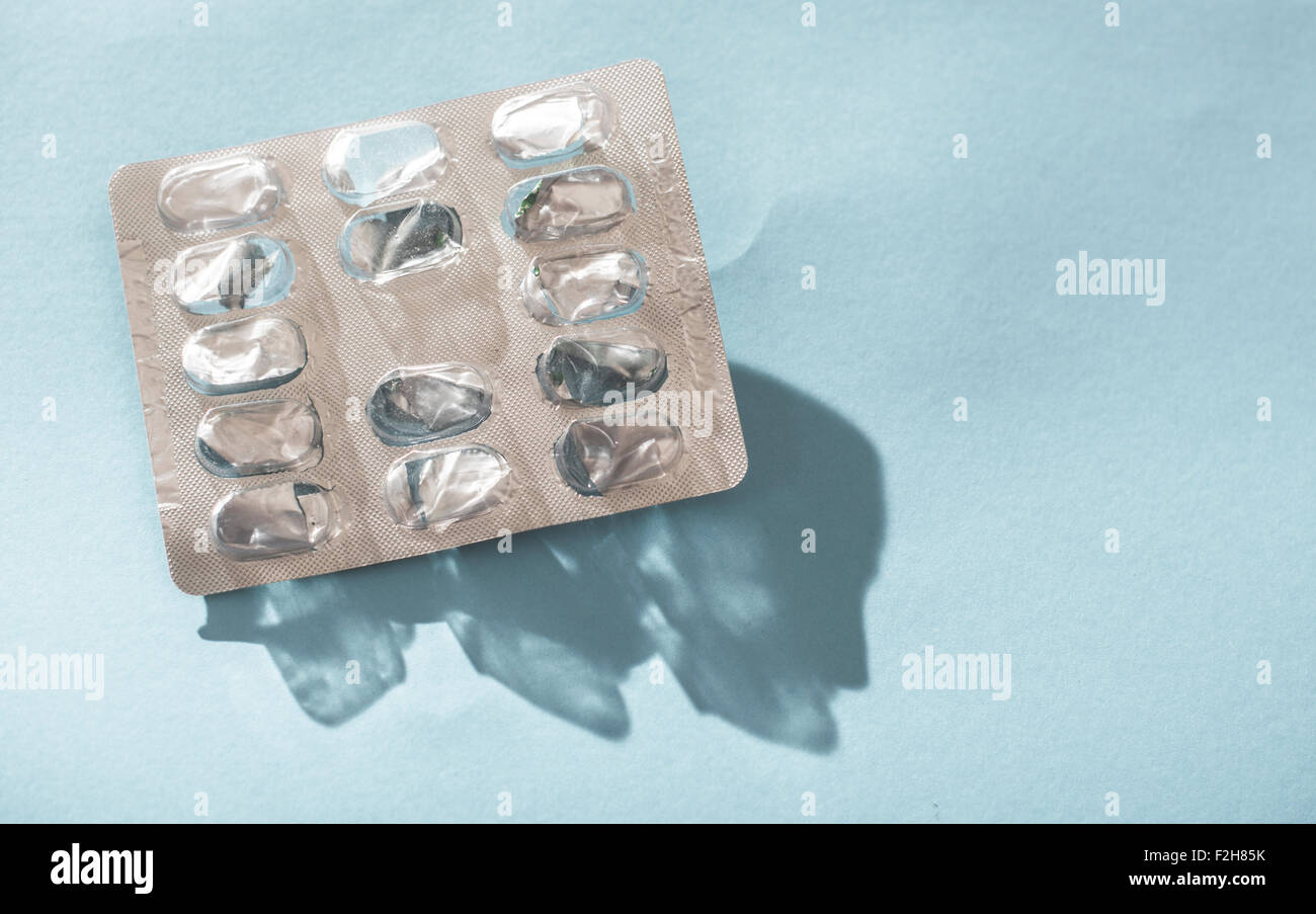 Empty blister pack drugs on blue background Stock Photo