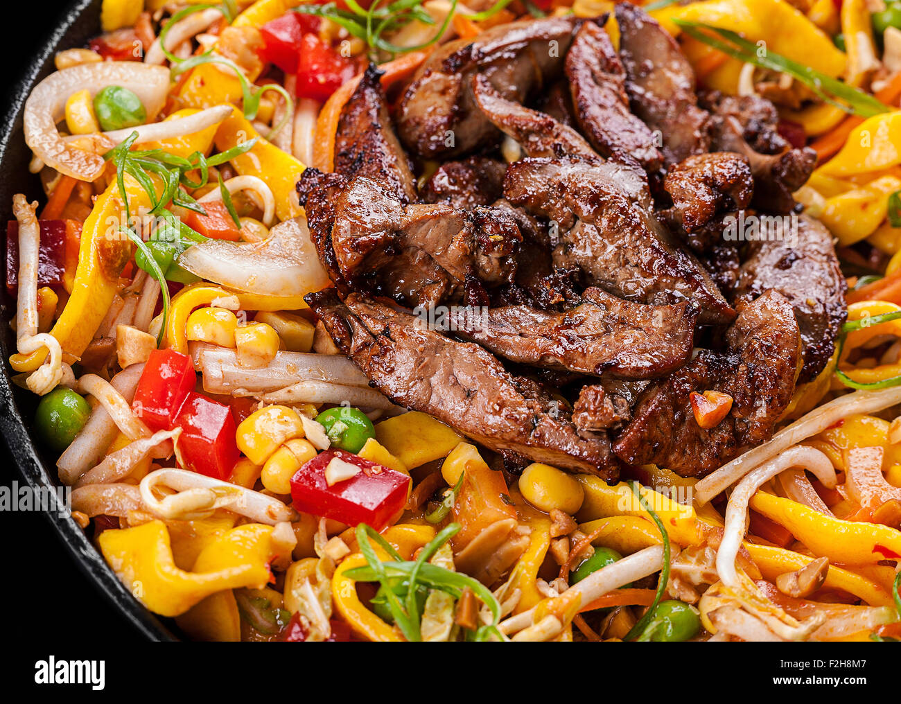Fried chicken liver with egg noodle and vegetable Stock Photo Alamy