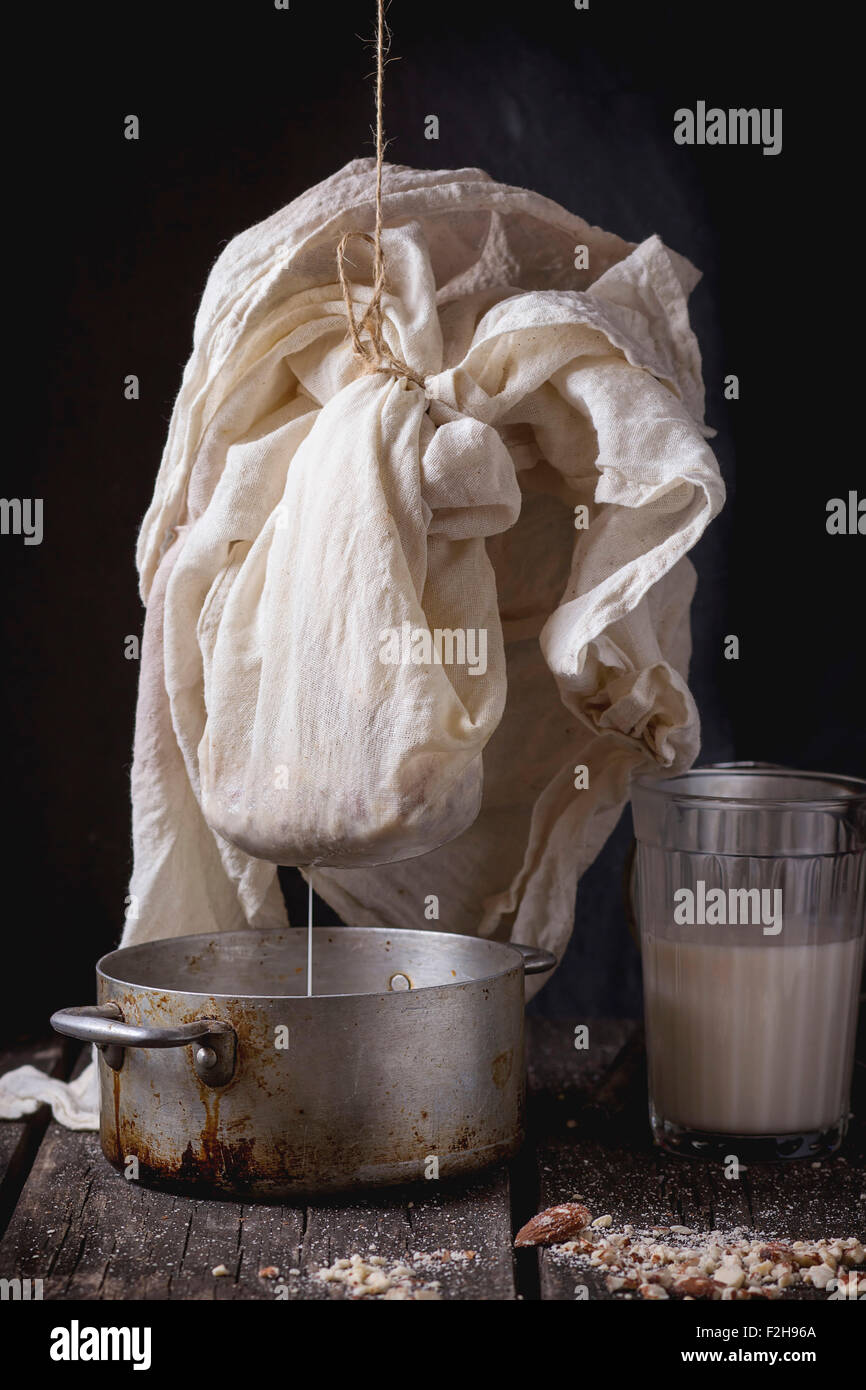 Process of making nondairy almond milk extraction of grain almond