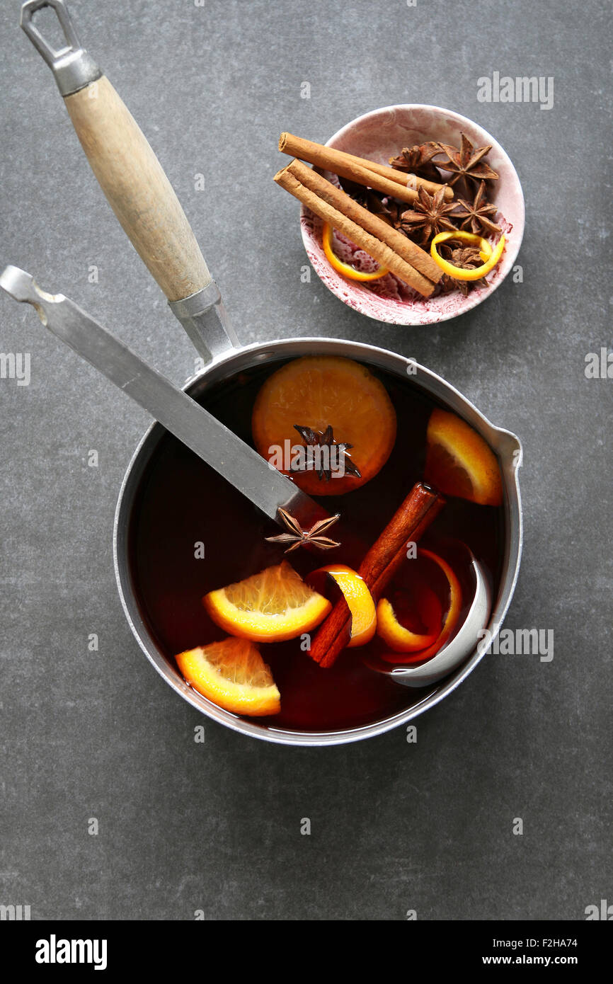 Infused wine with citrus,cinnamon,anise and brown sugar Stock Photo