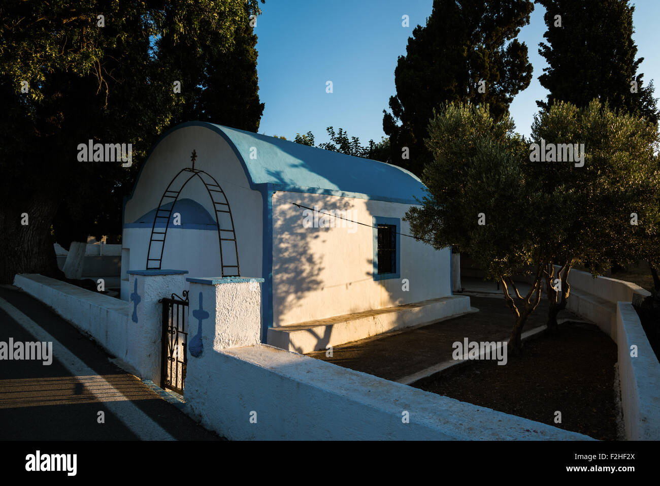 Traditional church in sunset in Kos island, Greece Stock Photo