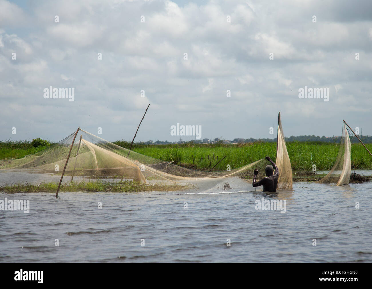 benin-west-africa-ganvi-fishermen-nets-on-lake-nokoue-stock-photo