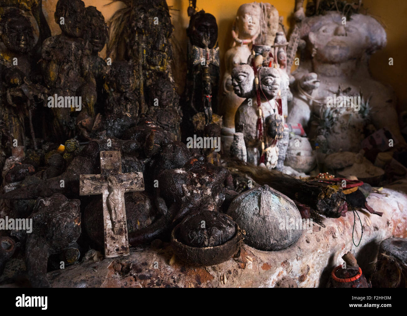 Benin, West Africa, Bonhicon, statues covered with oil and blood inside a voodoo temple for a ceremony Stock Photo