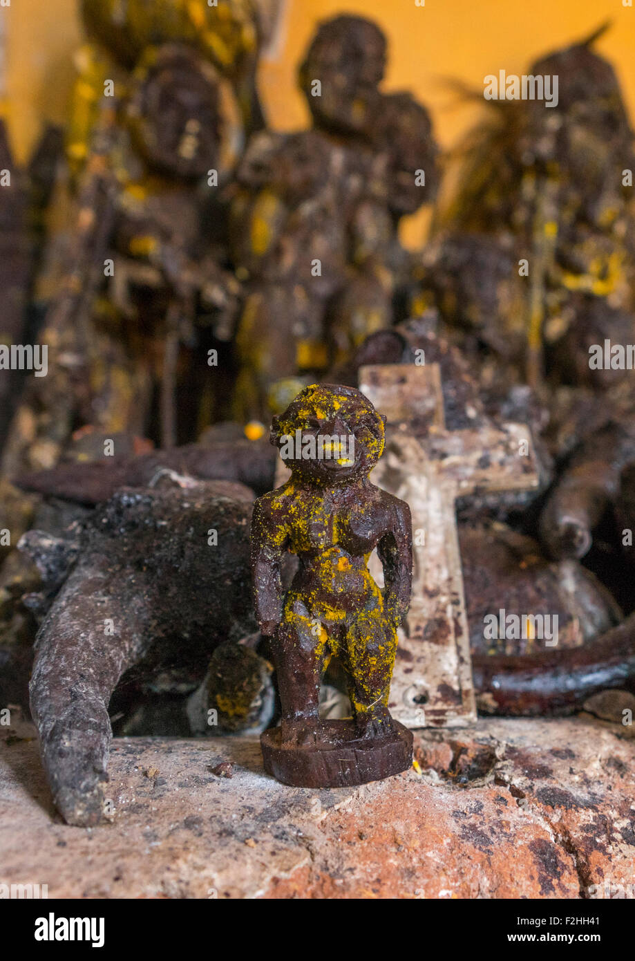 Benin, West Africa, Bonhicon, statues covered with oil and blood inside a voodoo temple for a ceremony Stock Photo