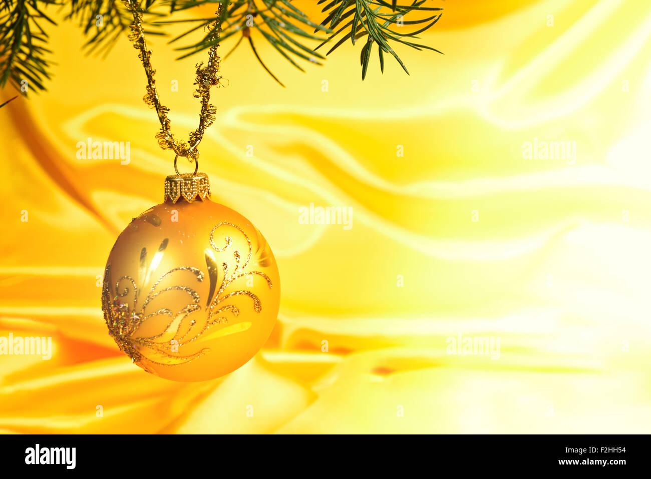 Yellow ball Christmas golden background Stock Photo