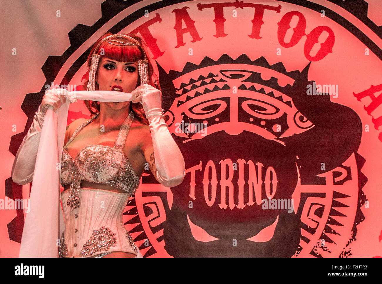 Turin, Italy. 19th September, 2015. Italian Tattoo Artists 2015 - Fire eater and burlesque Performer Genni Mirtillo Credit:  Realy Easy Star/Alamy Live News Stock Photo