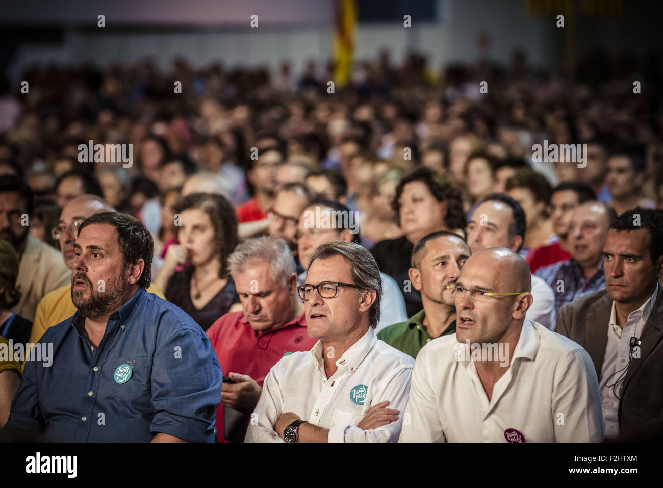 L'Hospitalet De Llobregat, Catalonia, Spain. 19th September, 2015. ORIOL JUNQUERAS, ARTUR MAS and RAUL ROMEVA, number 5, 4 and 1 of the pro-independence cross-party electoral list 'Junts pel Si' (Together for the yes) listen to a speech during the platforms central campaign act in L'Hospitalet de Llobregat. Credit:  Matthias Oesterle/ZUMA Wire/Alamy Live News Stock Photo