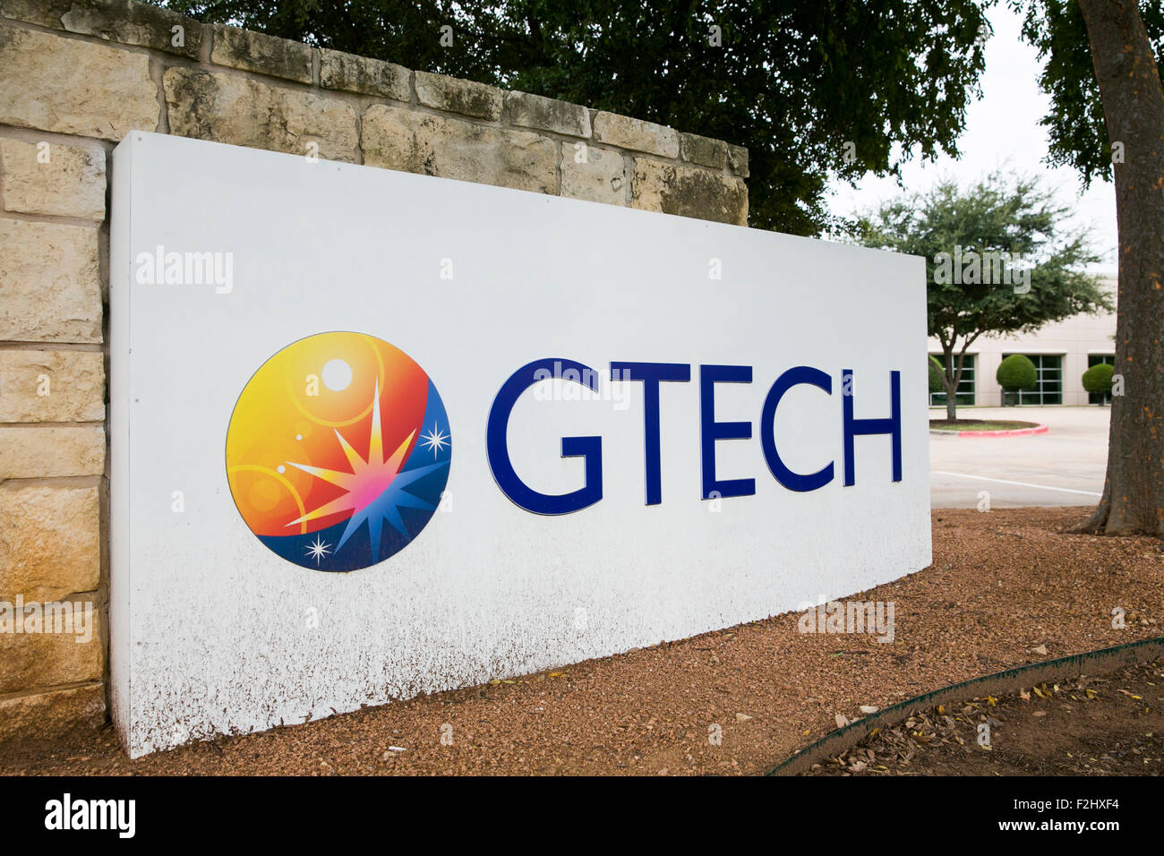A logo sign outside of a facility occupied by GTECH S.p.A., in Austin, Texas on September 11, 2015. Stock Photo