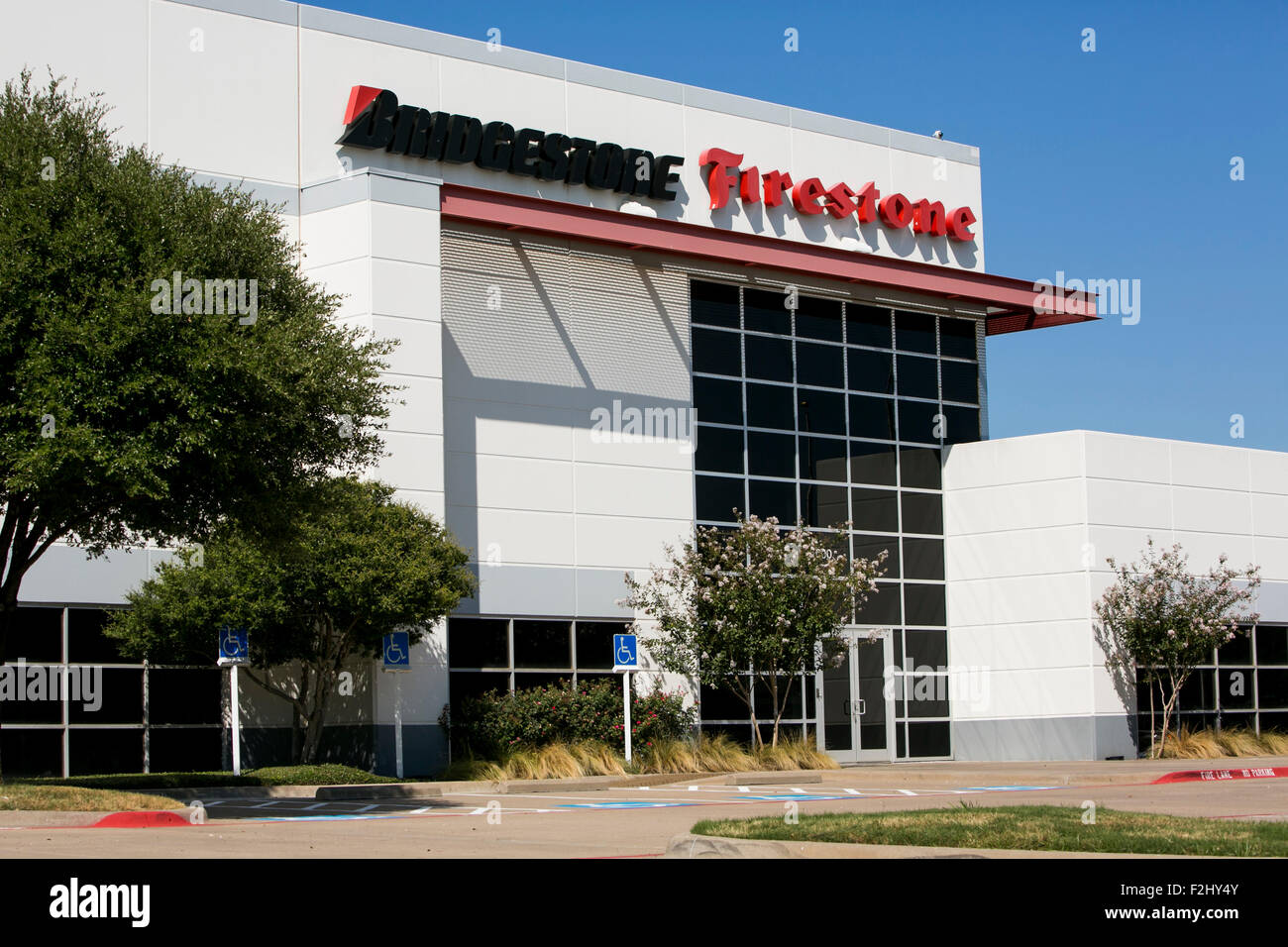 A logo sign outside of a facility occupied by the Bridgestone Corporation in Roanoke, Texas on September 13, 2015. Stock Photo