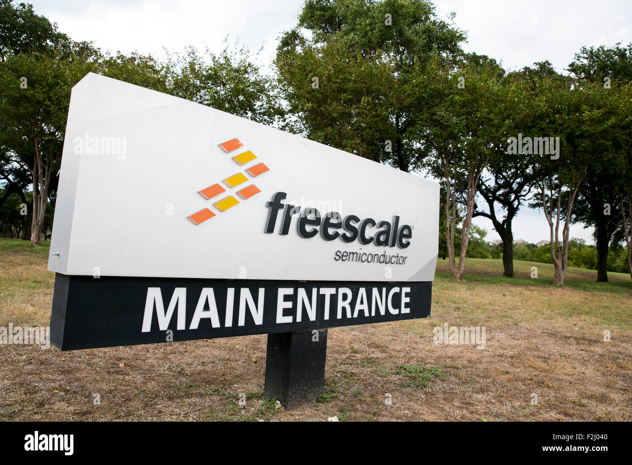 A logo sign outside of the headquarters of Freescale Semiconductor Inc ...