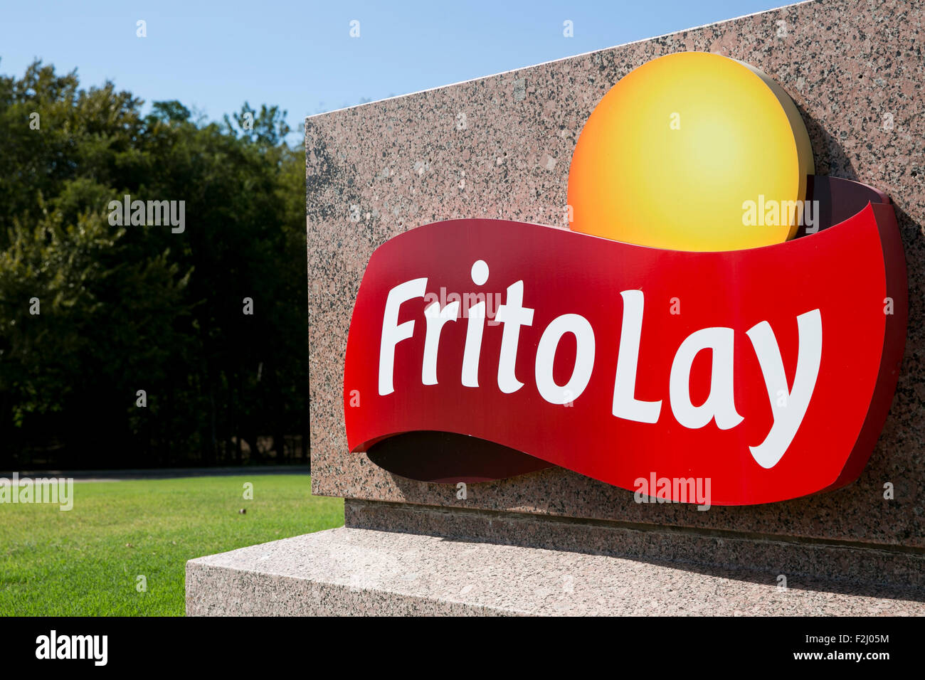 A logo sign outside of the headquarters of Frito-Lay, Inc., a subsidiary of PepsiCo, in Plano, Texas on September 12, 2015. Stock Photo