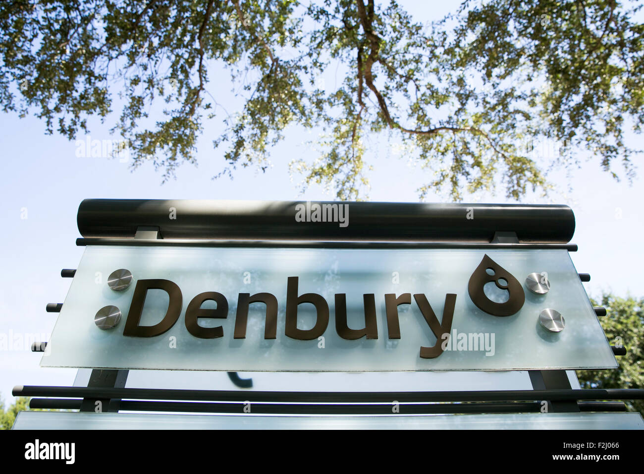 A logo sign outside of the headquarters of Denbury Resources, Inc., in