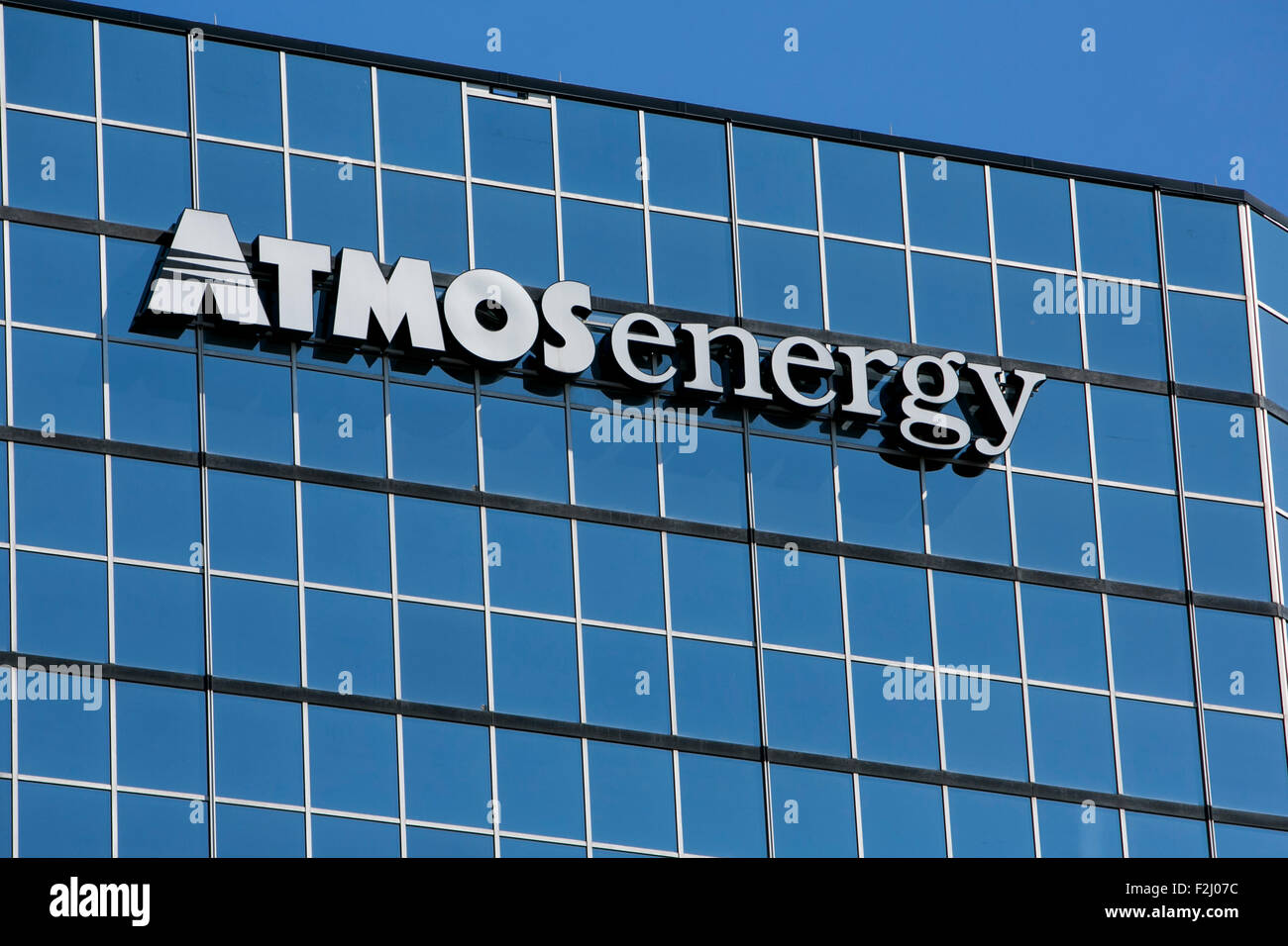 a-logo-sign-outside-of-the-headquarters-of-the-atmos-energy-corporation