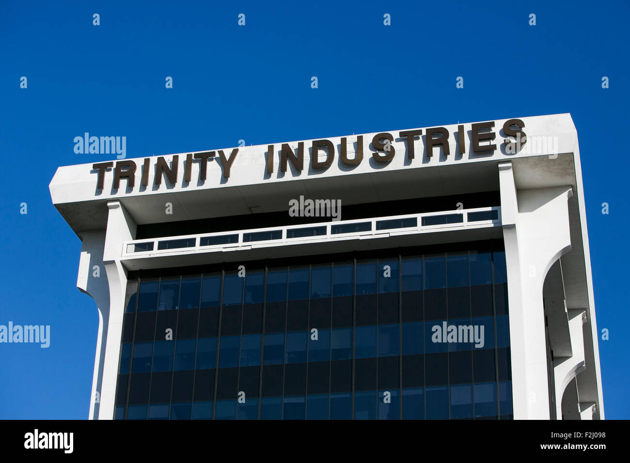 A logo sign outside of the headquarters of Trinity Industries Inc., in ...
